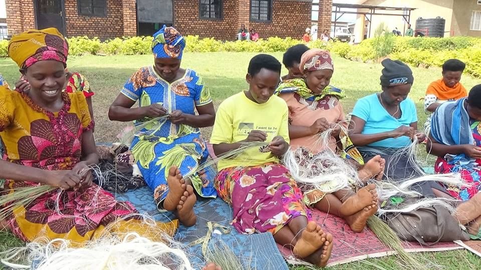 Women and families participating in community development activities